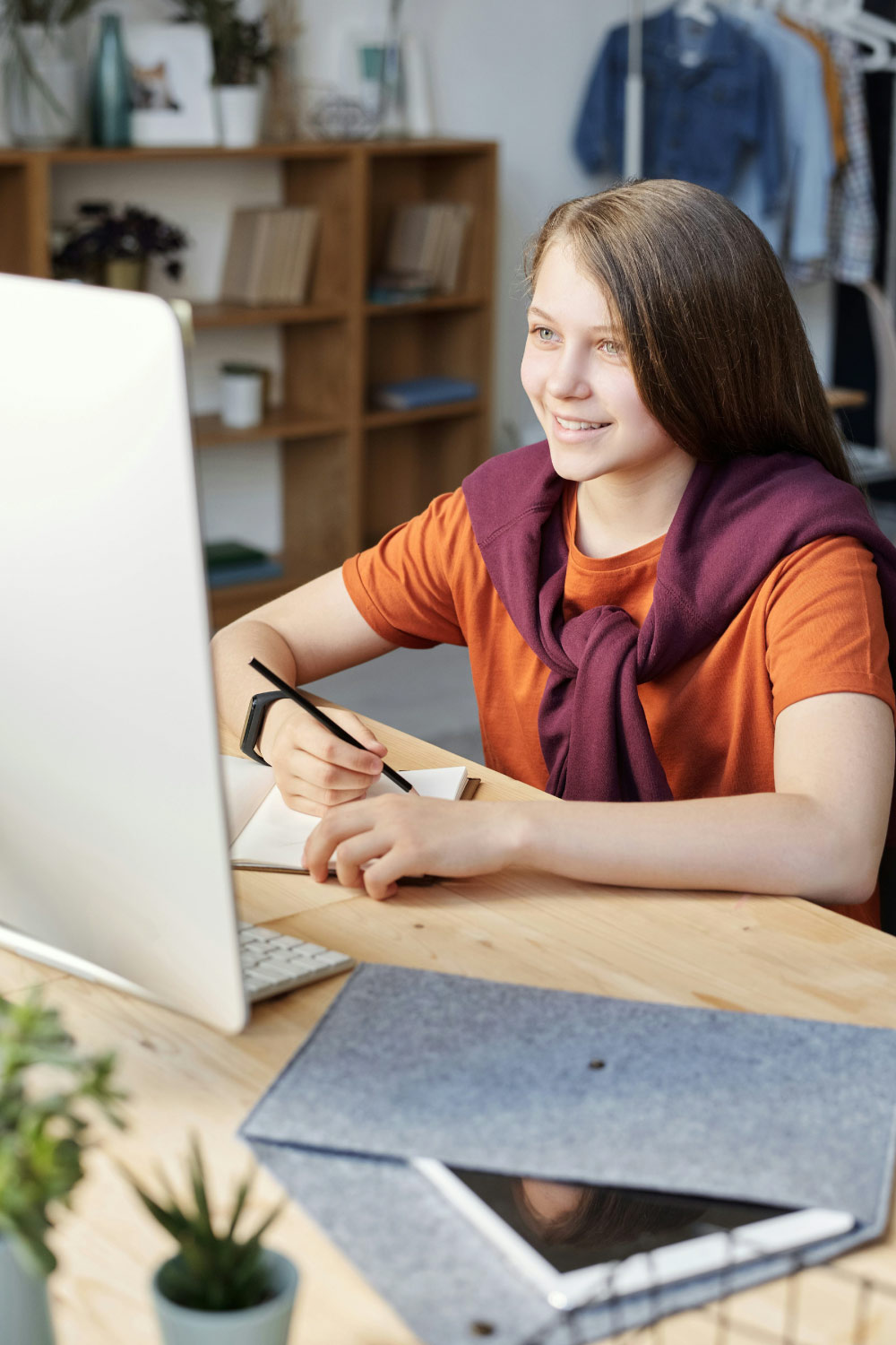 Online therapy with Behaved Brain Wellness Center in New Jersey. Young teen girl in a virtual therapy session.