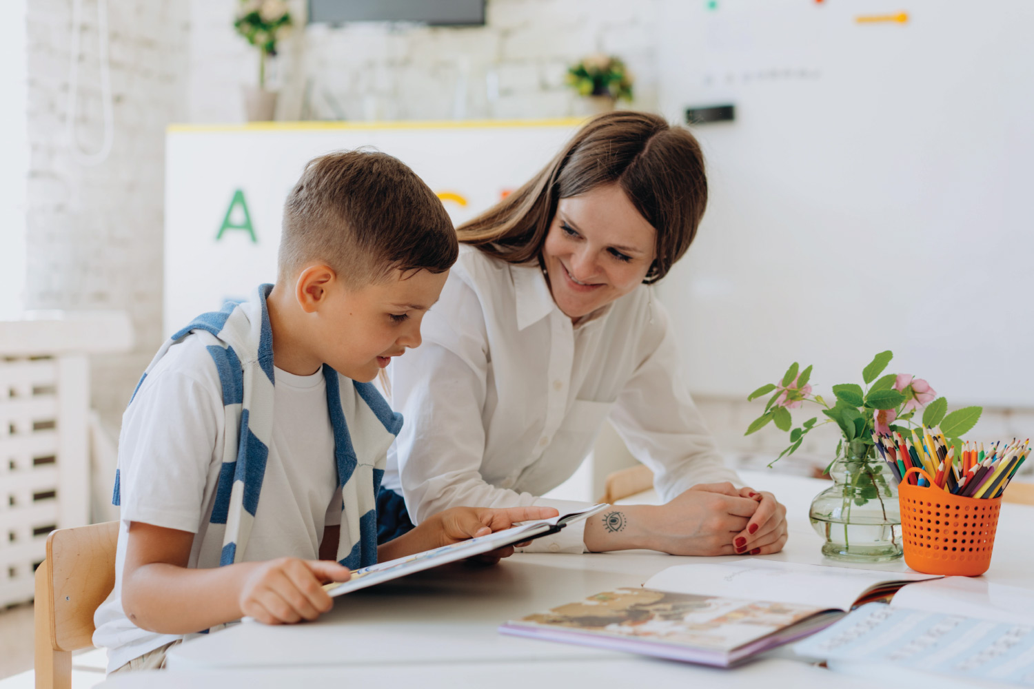 Parent reviewing school support options including an IEP or 504 Plan for a child with ADHD or anxiety