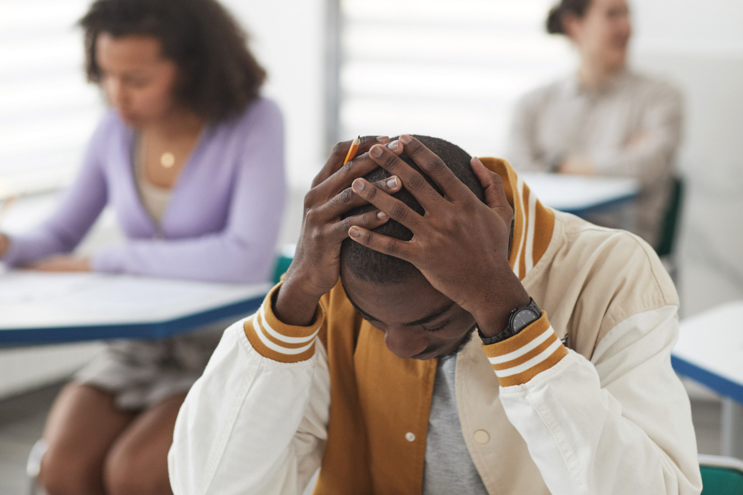 Parent supporting a child experiencing school refusal and back-to-school anxiety.