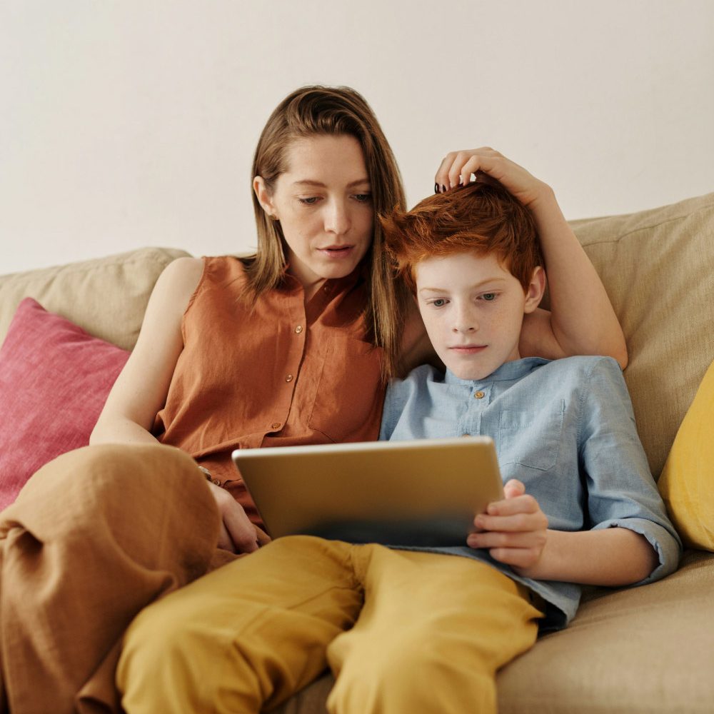 New-Jersey-Online-Therapy-at-Behaved-Brain-1 Online therapy with Behaved Brain Wellness Center in New Jersey. Mother and son on a virtual therapy call.