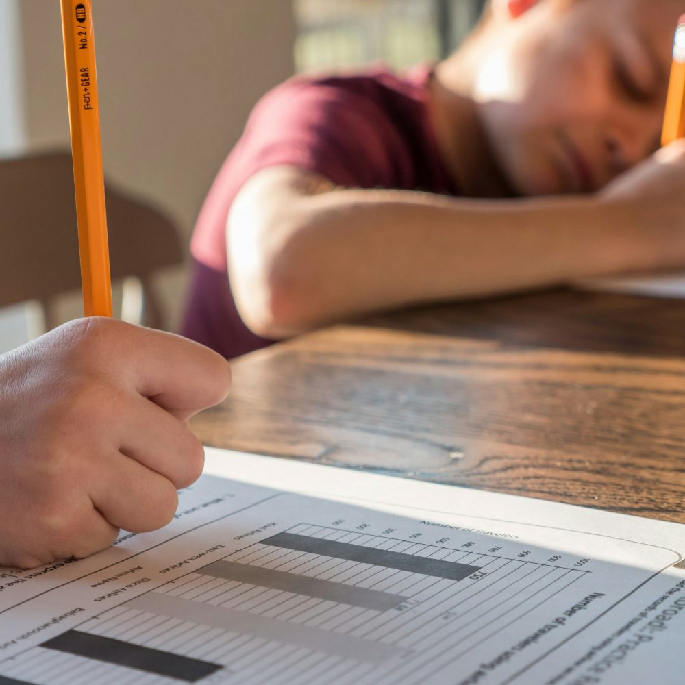 Psychoeducational Testing at Behaved Brain Wellness Center in Bergen County, New Jersey. Boys taking a test.