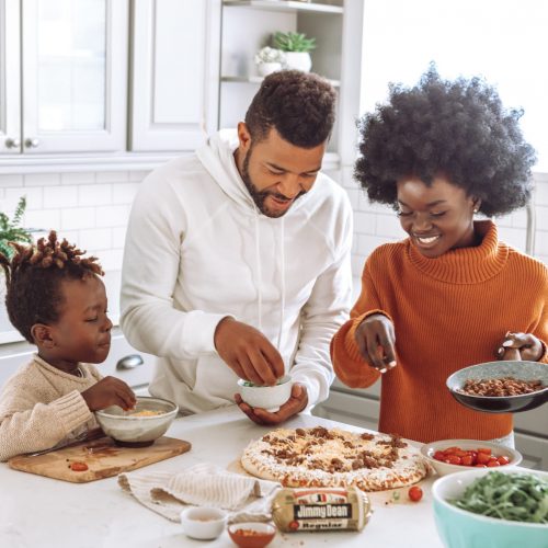 A family making a pizza